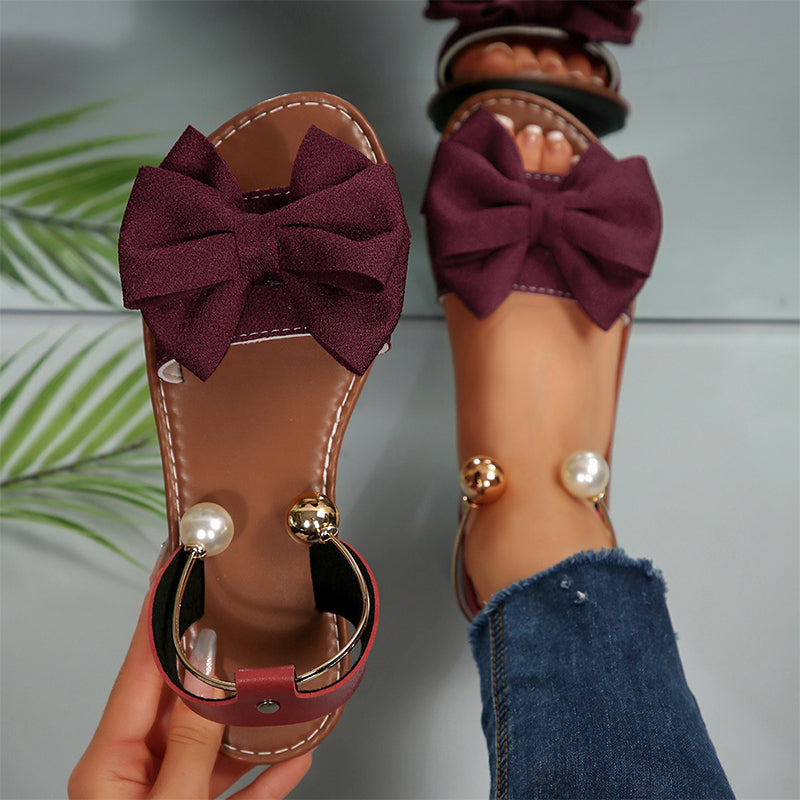 Elegant Gold Flat Sandals for Women with Bow Tie & Beaded Strap 2
