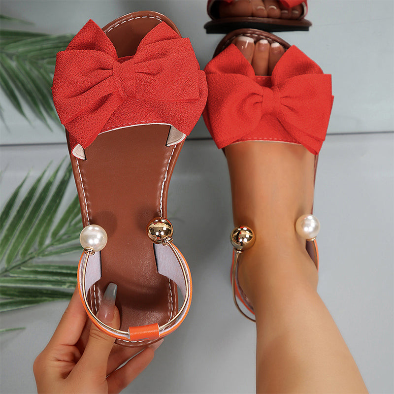 Elegant Gold Flat Sandals for Women with Bow Tie & Beaded Strap 4