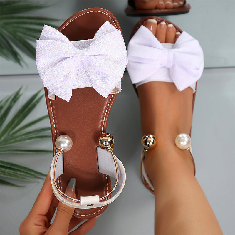 Elegant Gold Flat Sandals for Women with Bow Tie & Beaded Strap 6