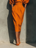 Women’s Orange Two Piece Set with Structured Top and Fitted Midi Skirt 2